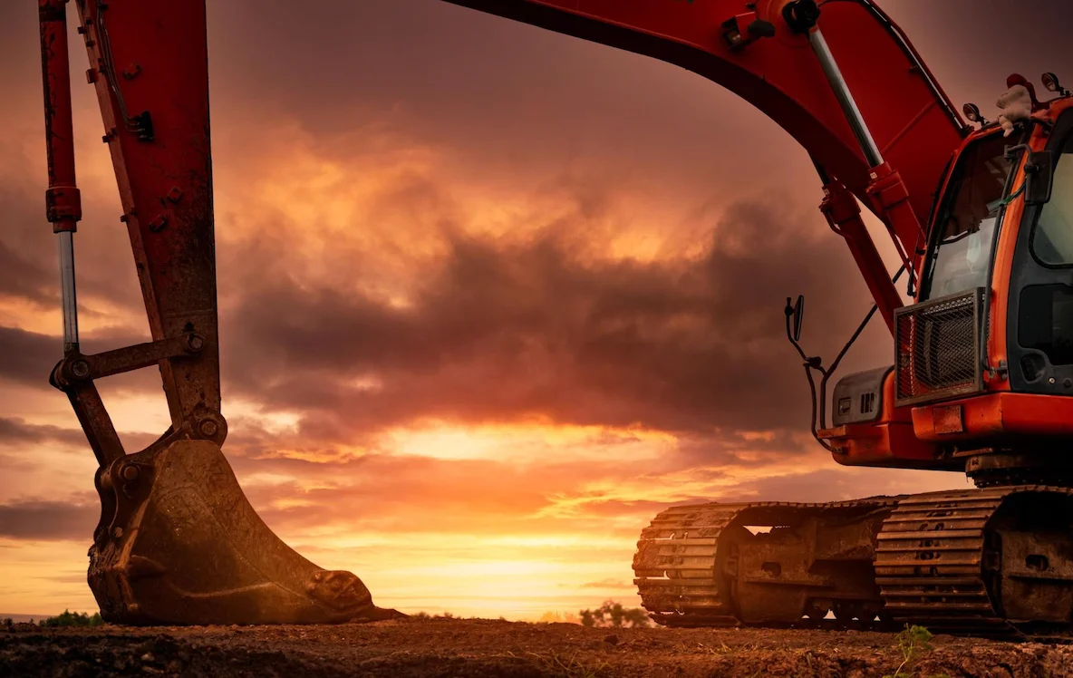 excavator at sunrise