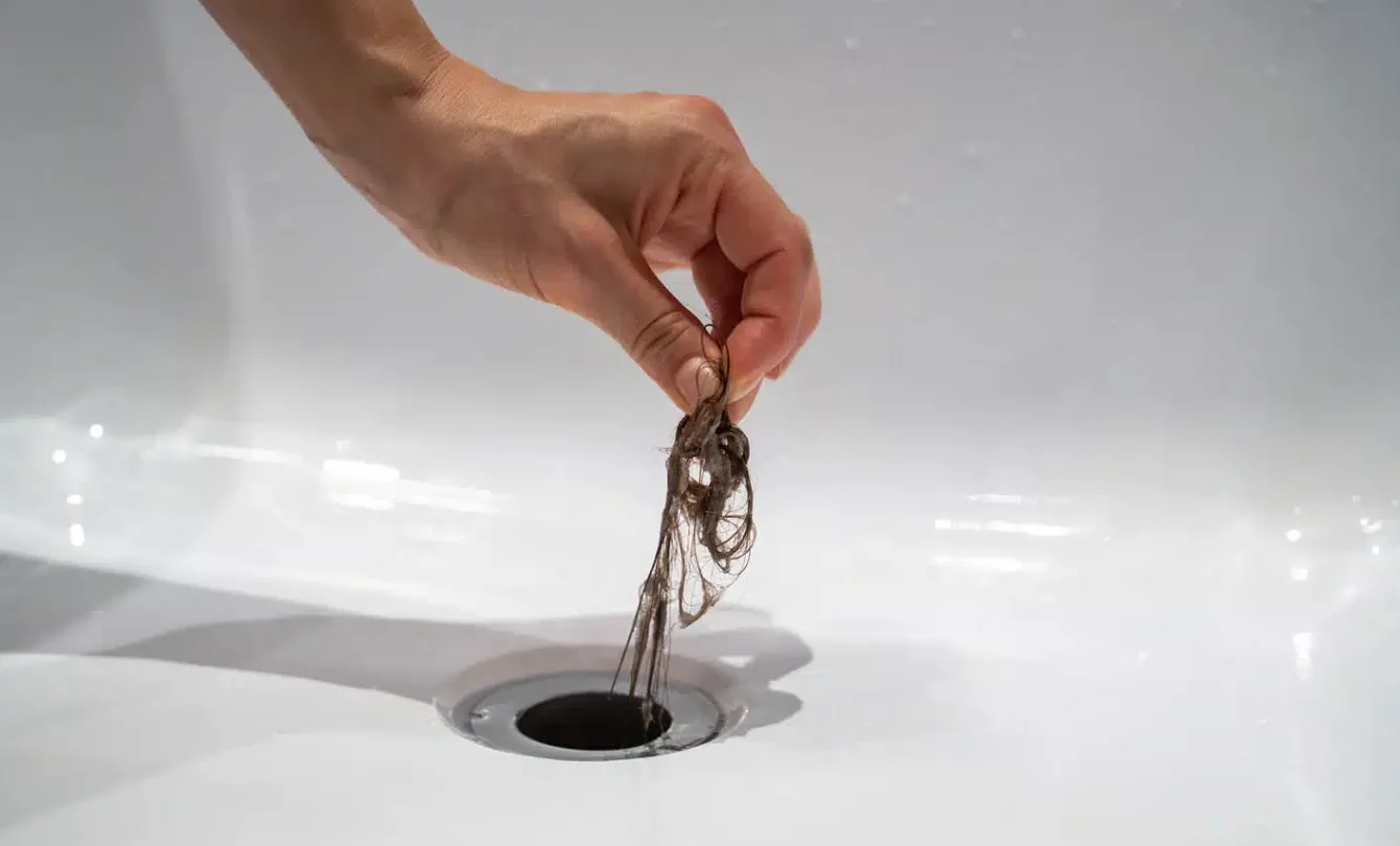 Why Your Drain Smells Fine But Still Drains Slowly